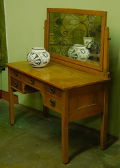 Gustav Stickley vanity dresser with integrated mirror and early hardware. Signed. 